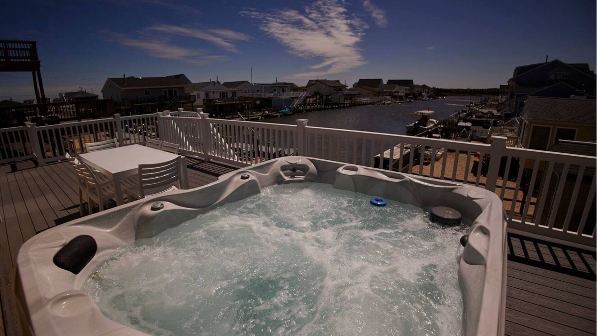 Tuckerton Beach House | Cozy waterfront home in an amazing community with pool and hot tub