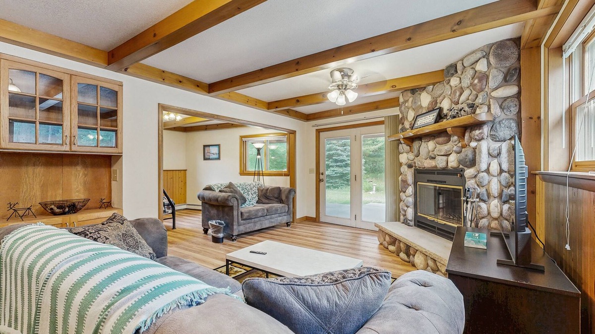 Friendship House | Cozy wooded duplex w/WiFi, full kitchen, shared W/D & near lakes & trails