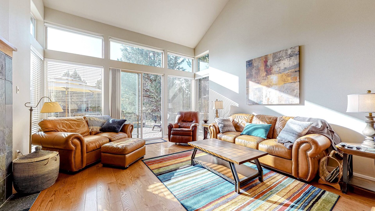 Redmond House | Creekside home with private hot tub & fireplace - access to pools, hot tub, gym