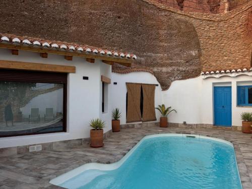 Alcudia de Guadix House | Cueva con vistas a Sierra Nevada en Alcudia de Guadix