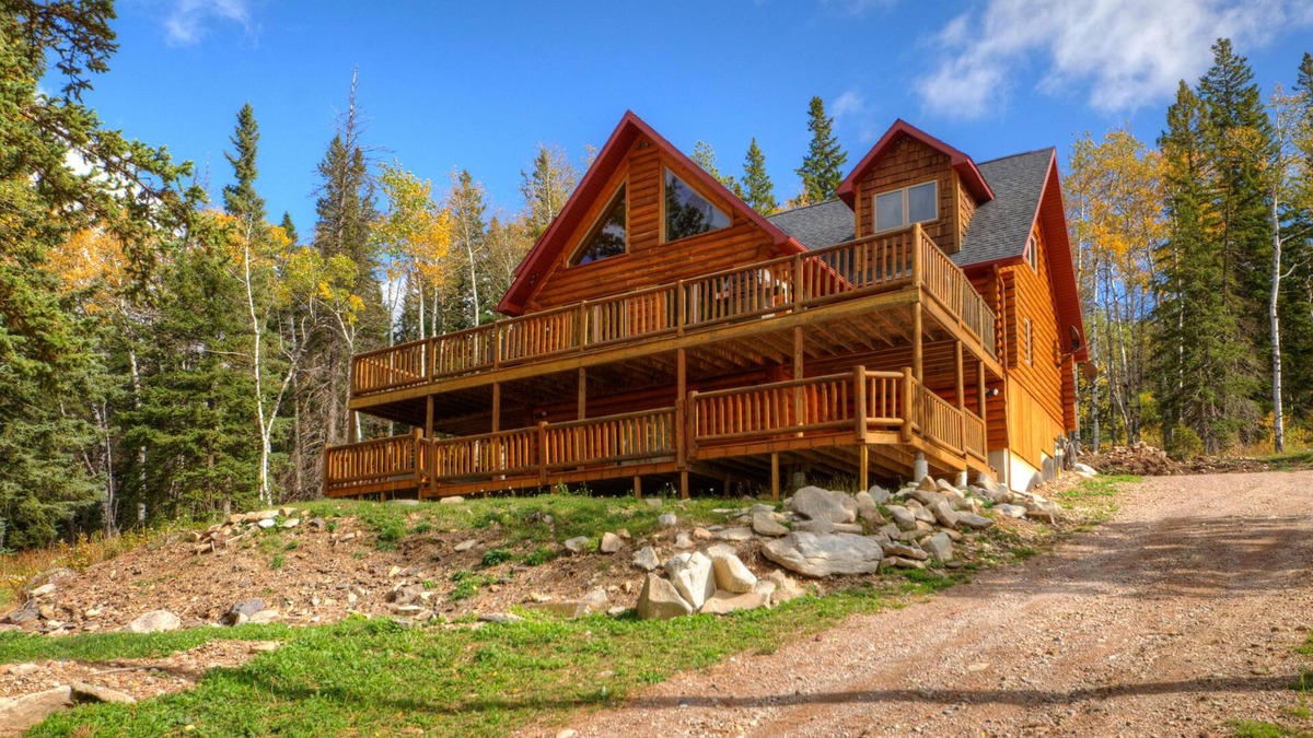 Lead House | Custom log lodge with private hot tub, gorgeous decks, game room & fireplaces