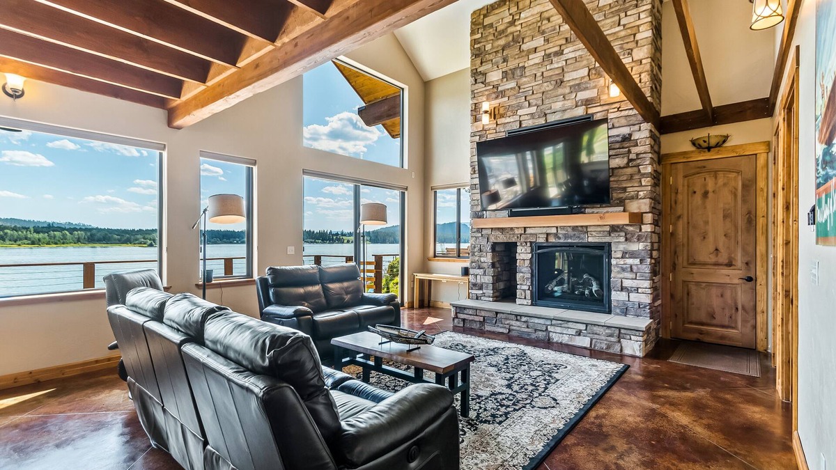 Laclede House | Custom riverfront home with private dock, game room, hot tub & heated floors