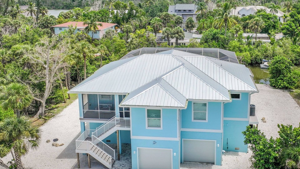 Sanibel House | DEJA BLUE | Lux Canal-Front Sanibel Home with Saltwater Pool and View