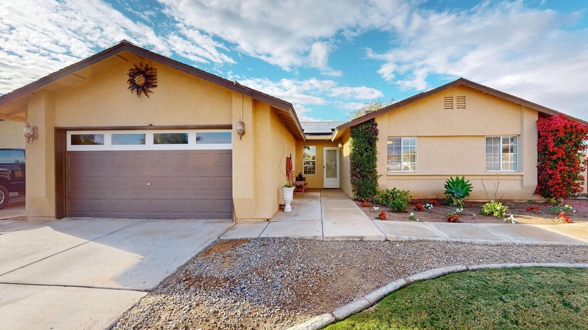 Yuma House | Delightful dog-friendly retreat with pool, yard, patio, & games - near golf
