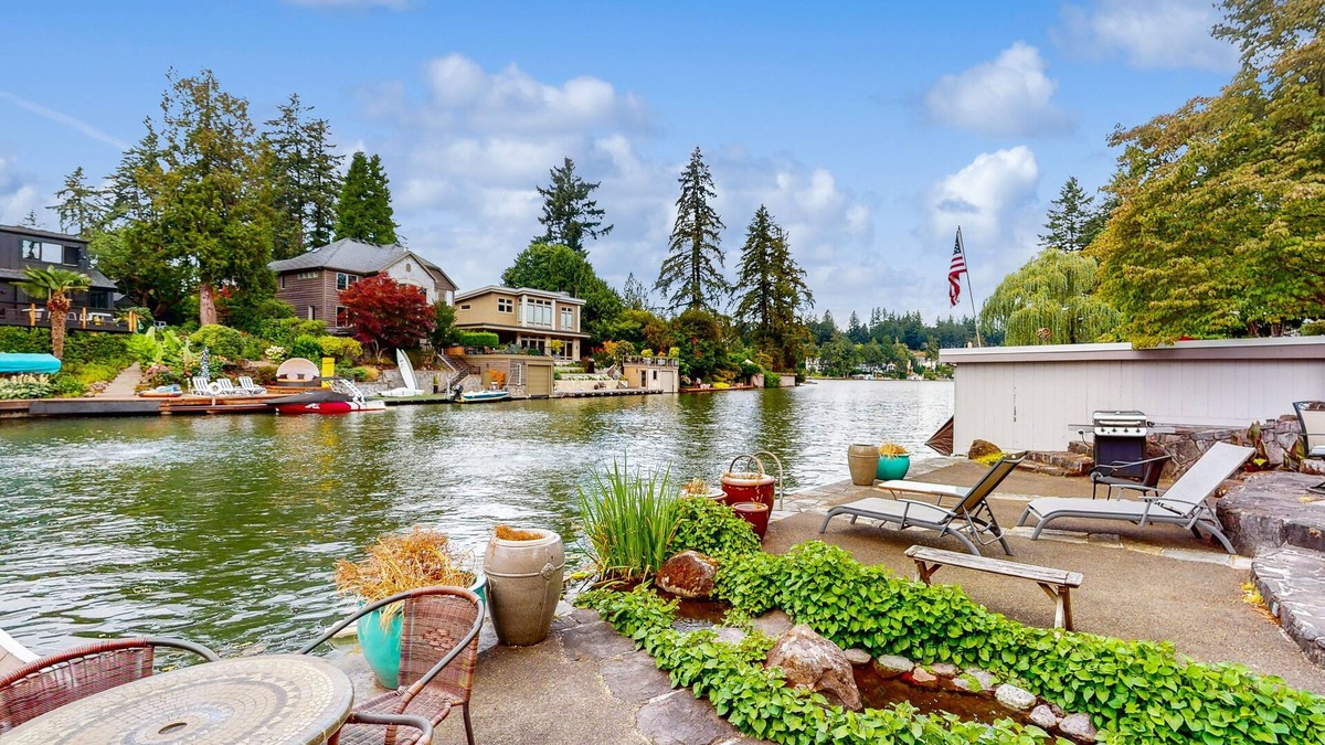 Blue Heron House | Delightful Retreat with Water Views, Fast WiFi, Gas Grill, & Furnished Patio