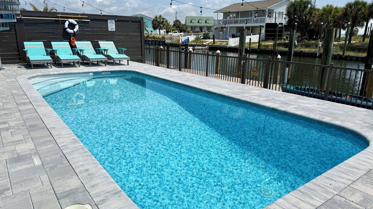 Navarre Beach House | "Delta Dawn" New Listing! Luxury Waterfront Home, Pool, Boat Dock