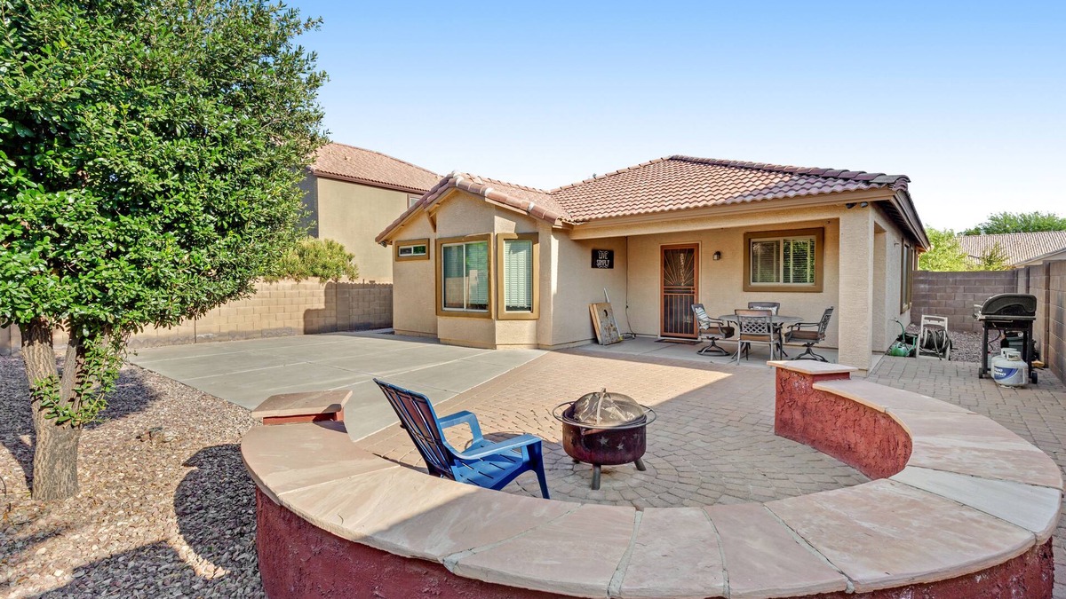 Power Ranch House | Desert oasis with an enclosed yard, firepit, washer/dryer, and central AC