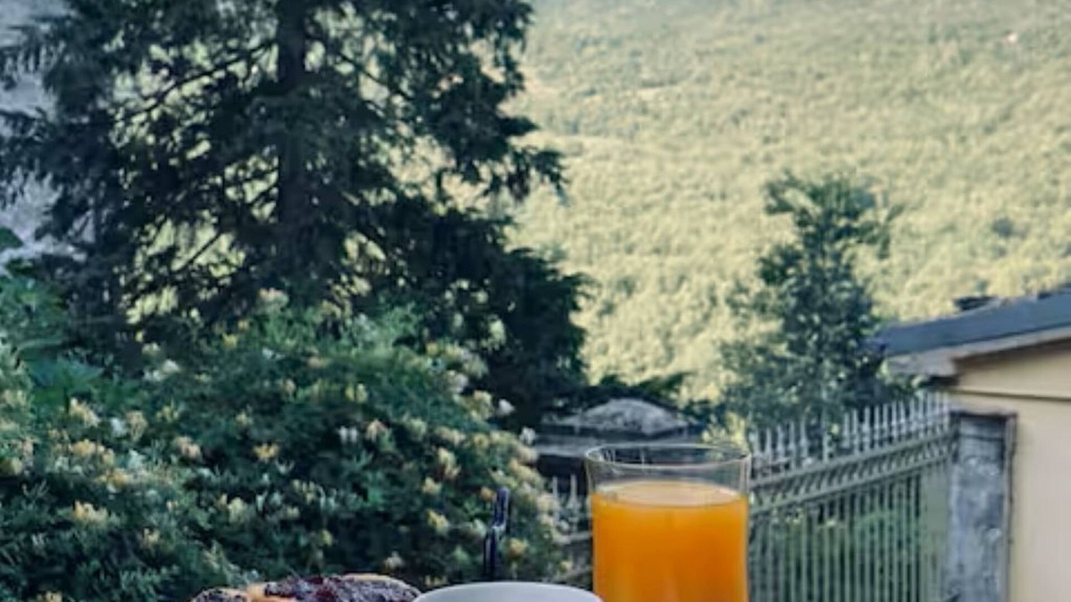 Caramanico Terme House | Designer home with artistic soul, a panoramic garden overlooking the mountains.