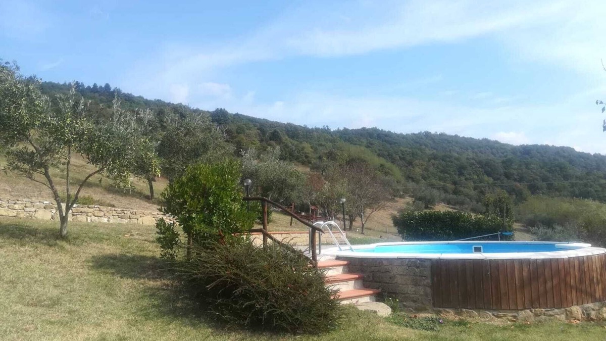 Dicomano Other | Detached stone view cottage with swimming pool and fenced garden.