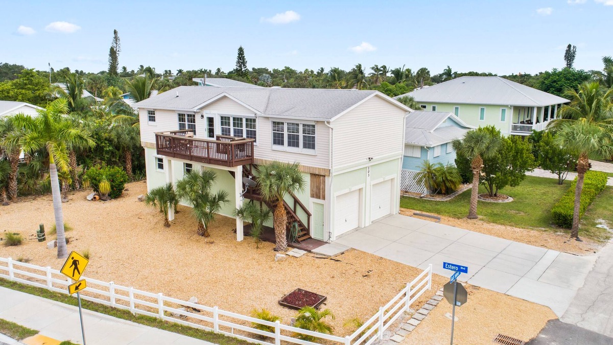 Mid Island House | Directly Across the street from the beach with Gulf Views!