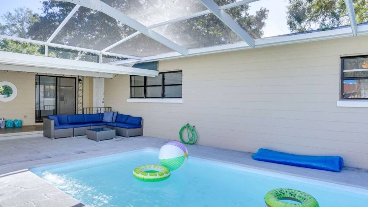 Cypress Gardens House | Discover Little Haven, a 3BR/2BA vacation home in Winter Haven with a heated pool, full amenities, and prime location—just 3 miles to LEGOLAND, 30 miles to Disney, and minutes from lakes, scenic trails, and family attractions.