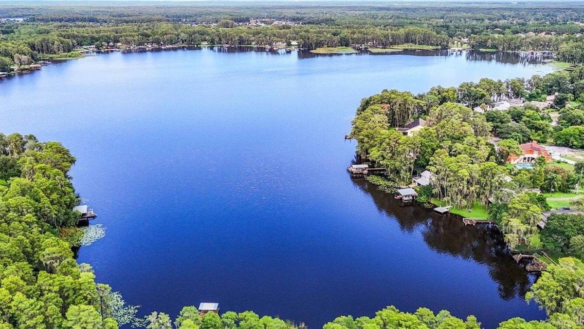 Land O' Lakes Cabin | Discover tucked away 5-bedroom lakefront cabin getaway in Land O' Lakes with AC