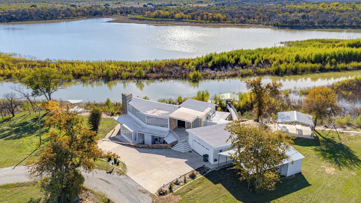Runaway Bay House | Dock & Fire Pit: Riverfront Runaway Bay Retreat
