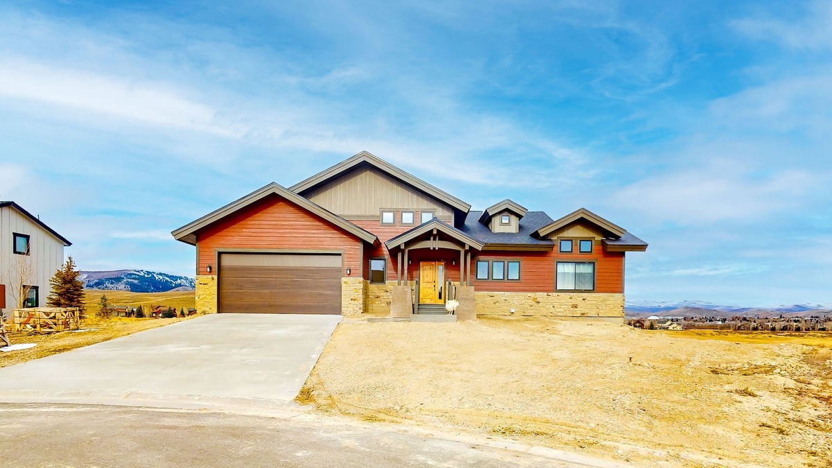 Grand Elk Ranch House | Dog-friendly golf course-front home with mtn & ski views, fireplace, & balconies