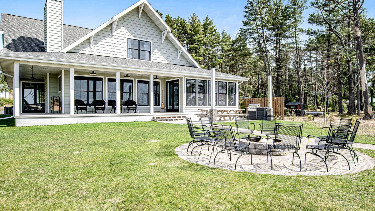 St Germain House | Dog-friendly, lakefront house with beach access, dock, AC, W/D, patio, & firepit