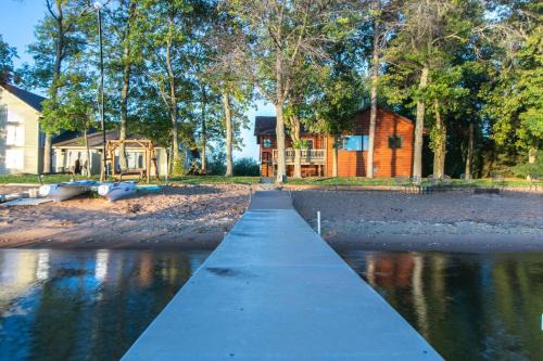Walker House | Dog Friendly Leech Lake Home w Perfect Beach Garage Boat Lift