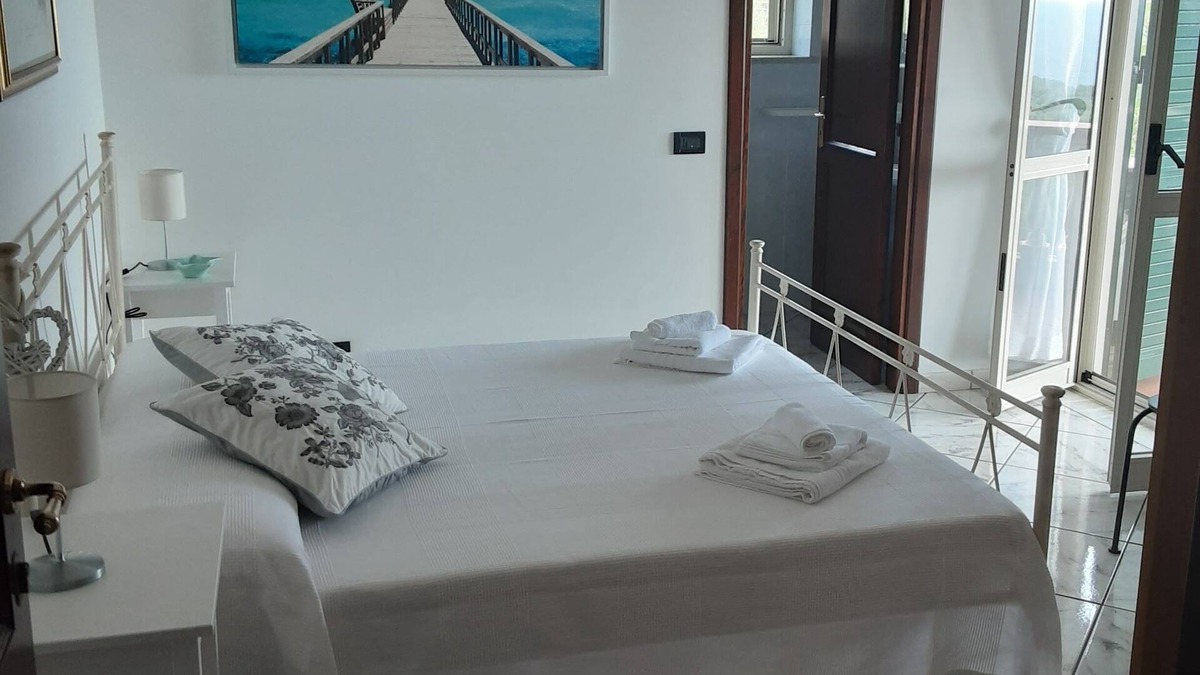 Marina Di Camerota Apartment | Double room with bathroom, small terrace with sea view