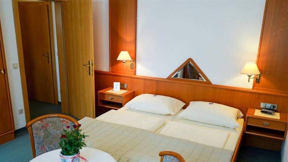Bad Eisenkappel Cottage | Double room with balcony - Pension Besser