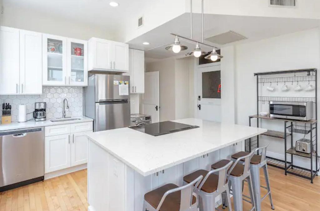 Boise Apartment | Downtown Digs-View of the City! Stay above local restaurants and nightlife, posh amenities heated toilet seat, oversized rain shower head in glass shower, in-unit laundry, one garage parking spot