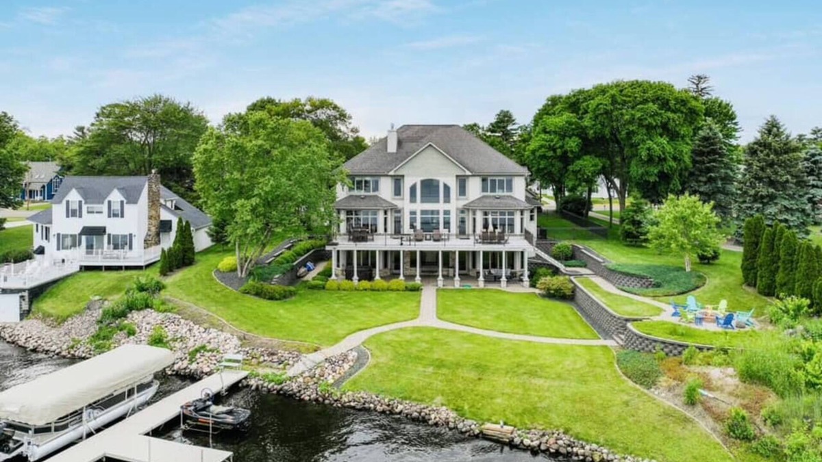Chetek House | Downtown Lakefront Home on Lake Chetek w/hot tub & pontoon & jet ski rental