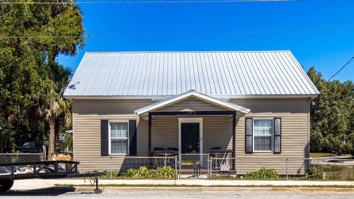 Lake City House | Downtown three bedroom house with game room and outside lounging area.