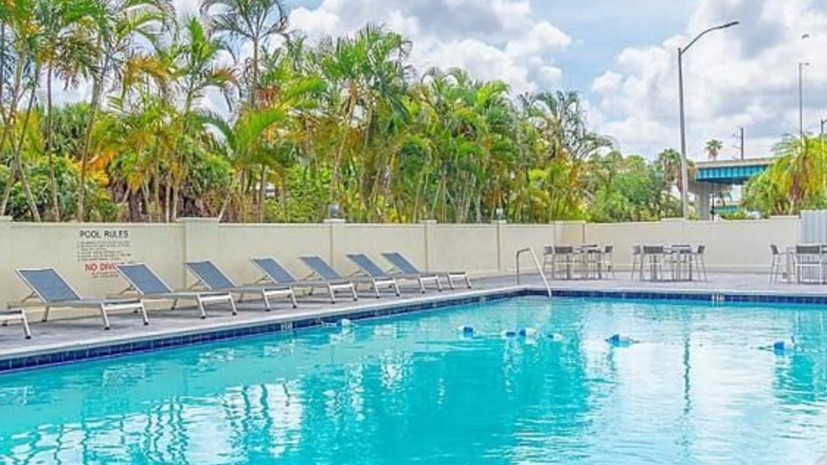 Miami Springs Hotel | Dream Family Vacation! 2 Classy Units, Pool, Fitness Center, Near Marlins Park!