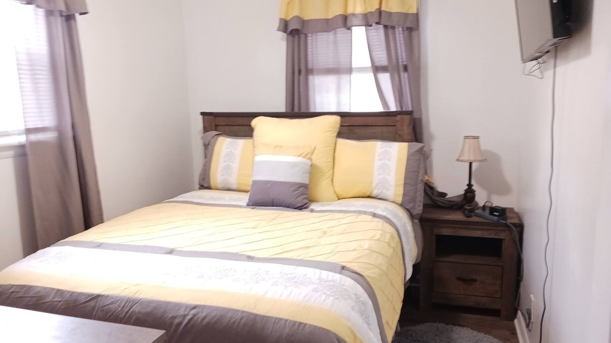 Saginaw House | Earnie's Place - Cozy 2 BR Home with Fireplace, Sports Fan Cave Garage