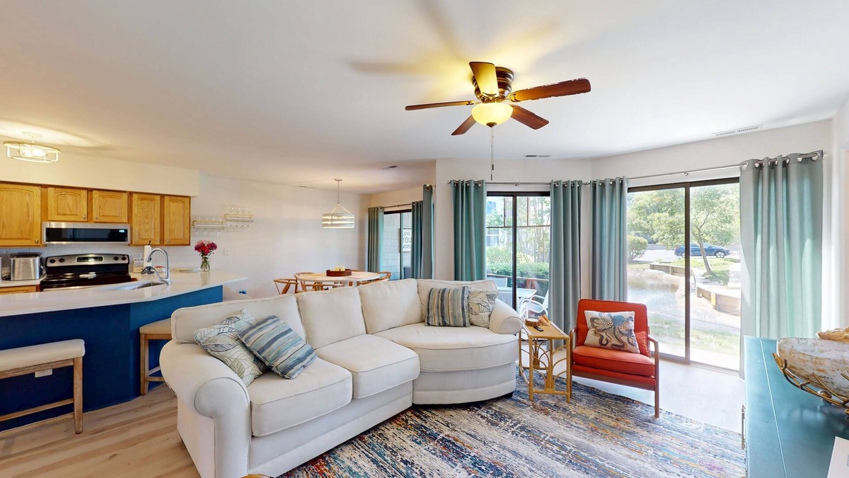 Fenwick Island Condo | East of Sun condo with water-view patio, on-site pool & tennis - near beach