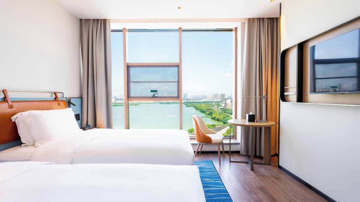 Caidian District Hotel | ECHARM HOTEL WuHan Sports Center Branch