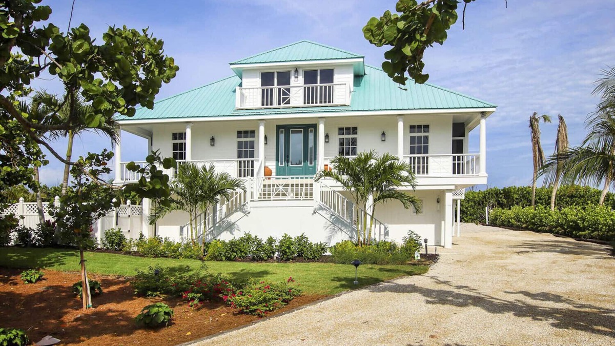 Wulfert House | Elegant 4-Bedroom Beachfront Estate with Private Pool & Spa