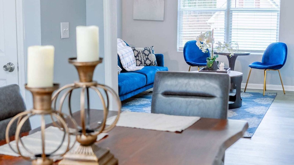 Fairburn House | Elegant Haven: Stylish Interiors with Serene Deck Views and Modern Comforts