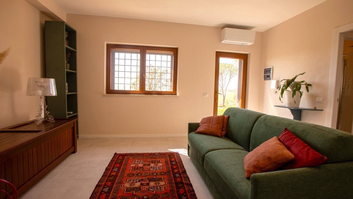 Belvedere Ostrense Apartment | Elegant new house with garden, veranda and shared pool