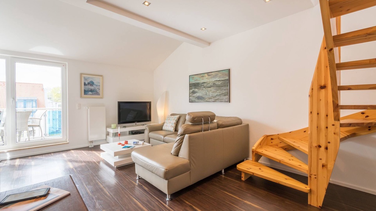 Juliusruh Apartment | Elegant vacation apartment with south-facing balcony, 100 m to the beach