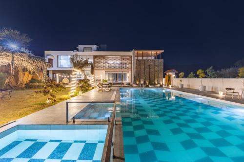 Bedla Villa | ELIVAAS Prive 5 BHK Kvanya Mansion with Pvt Pool & Home Theater