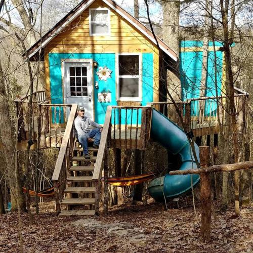 Stonewall House | Enchanting Tree House with a Slide on 200 Acres for a Family Adventure in Germantown, Kentucky