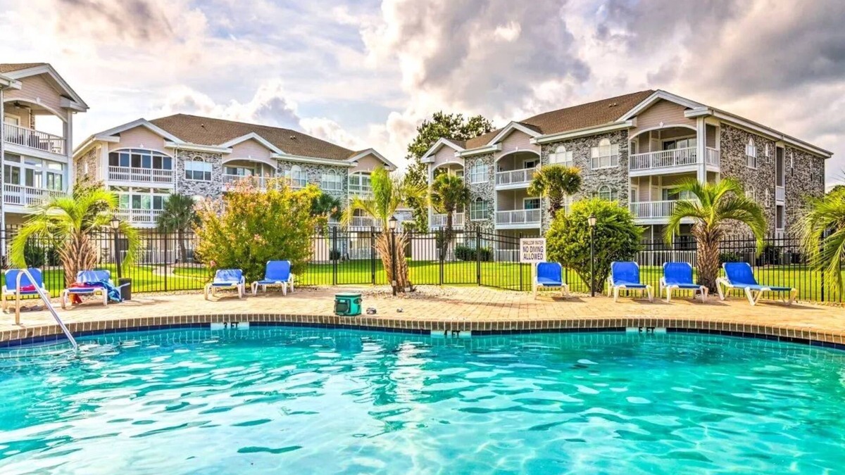 Central Myrtle Beach Condo | Endless Summer Updated Condo at Magnolia Place - Pool & Golf Course Views!
