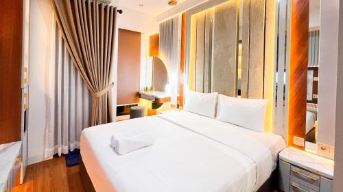 Tetebatu Apartment | Enigma Studio at Apartment Delft Ciputra Makassar By Travelio