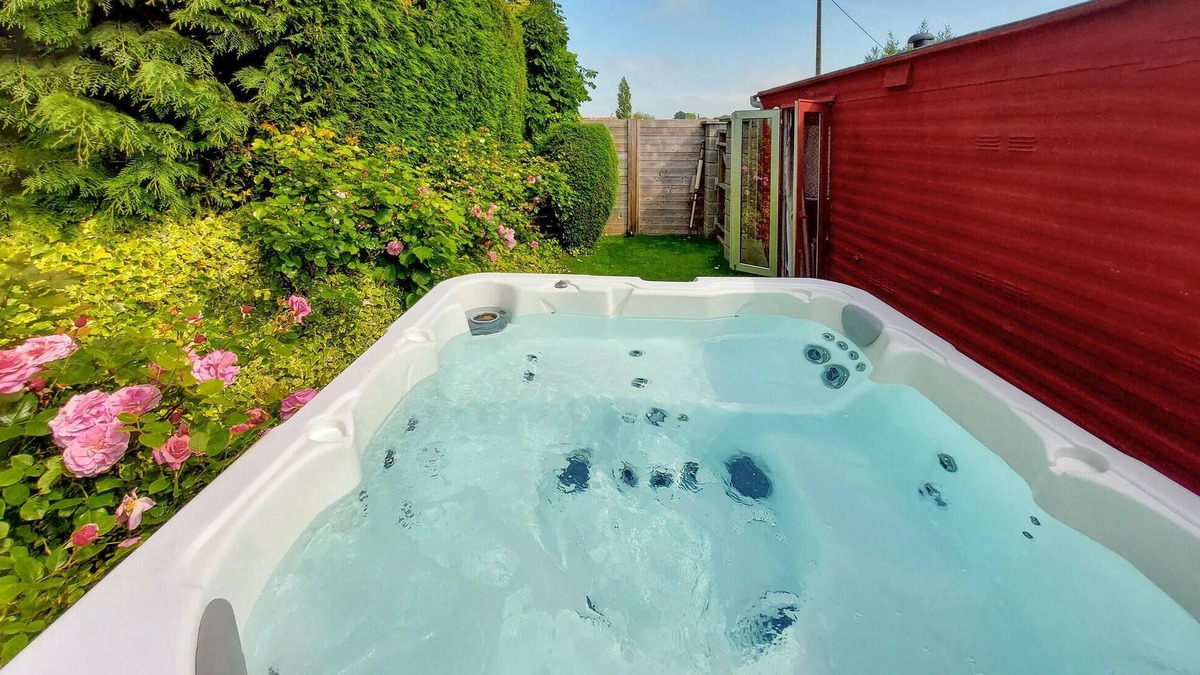Le Ponthou House | Enjoy an unforgettable time in this idyllically located vacation home with outdoor hot tub.