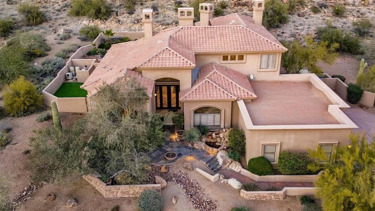 Mountain Park Ranch House | Enjoy breathtaking views of the mountainside throughout this hillside estate.