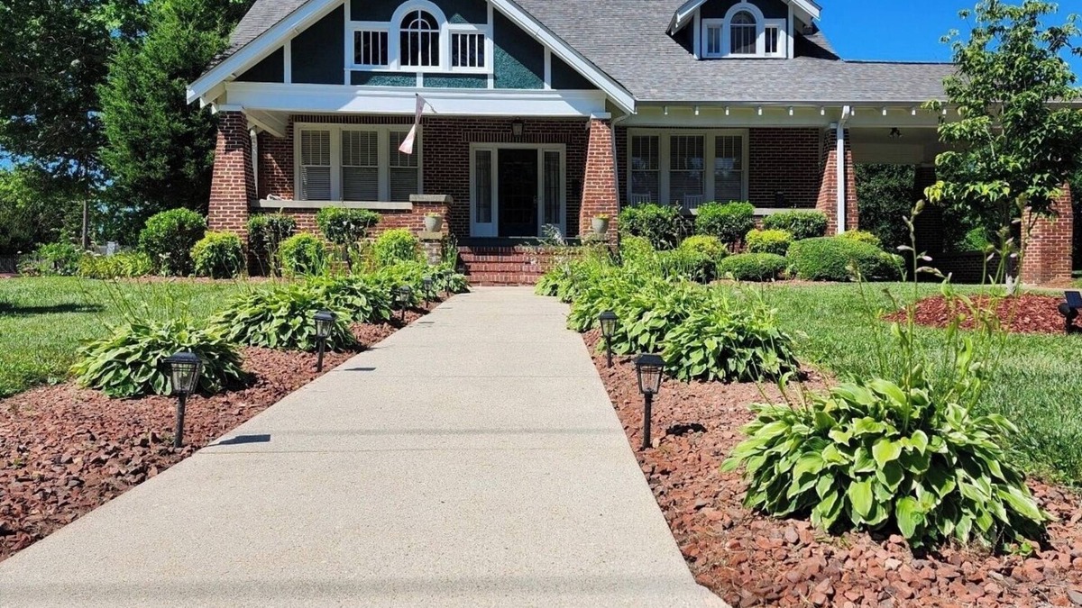 Mount Airy House | Enjoy small-town, Main Street from the front porch of this historic bungalow!