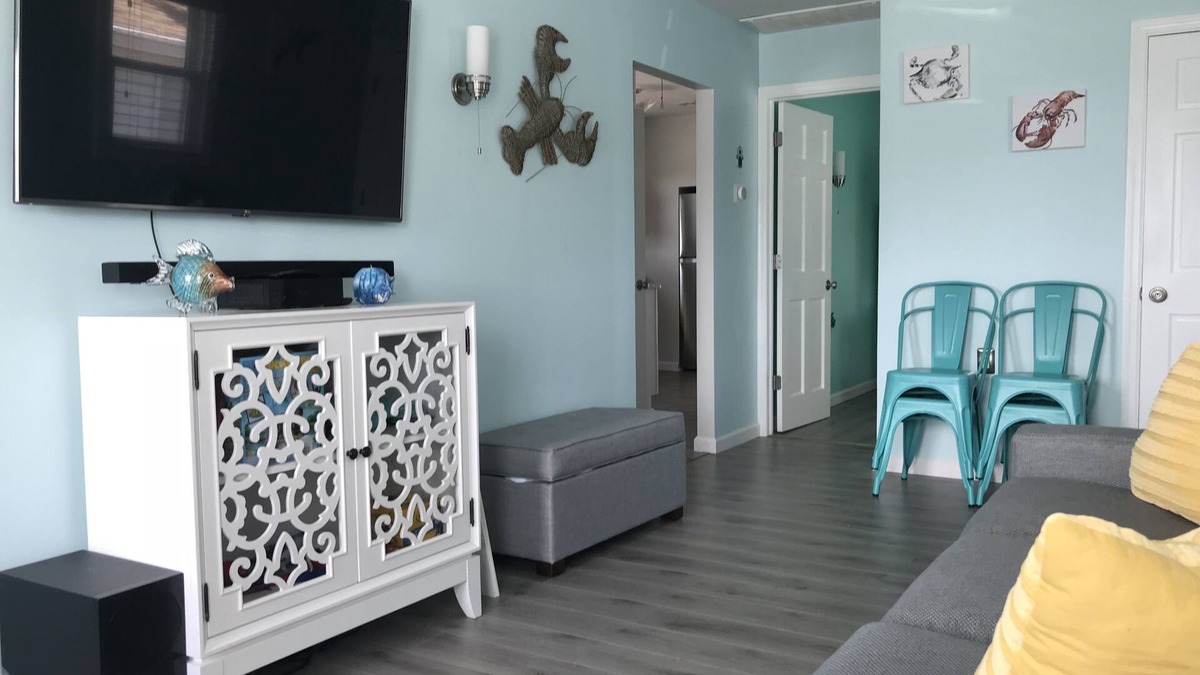 Ortley Beach House | Enjoy sunsets at this modern cottage with large backyard and peekaboo bay view.