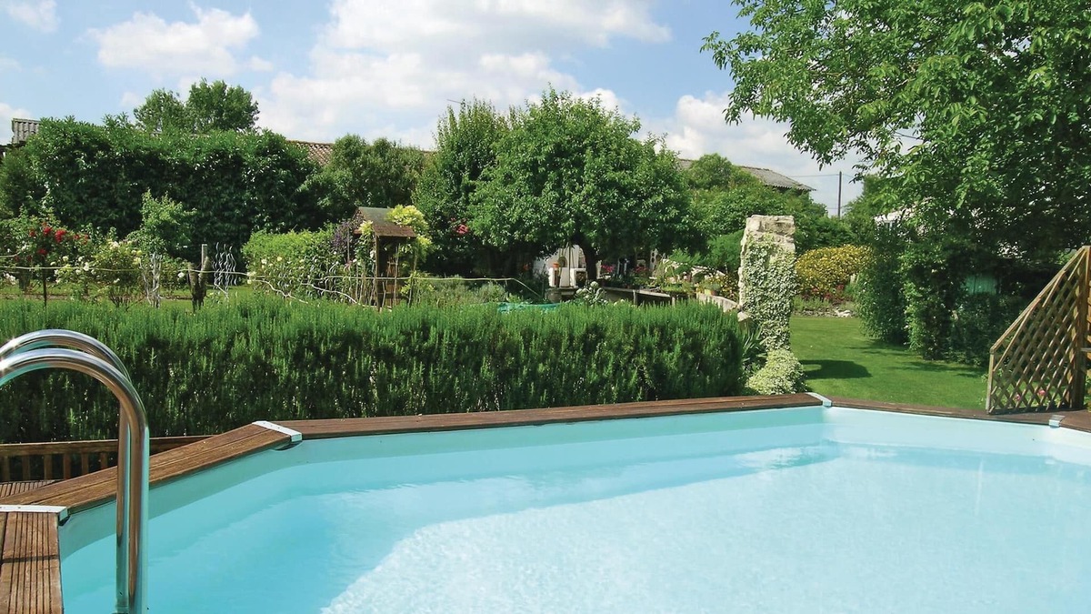 Marigny House | Enjoy the comfort in this beautiful vacation home with community pool.