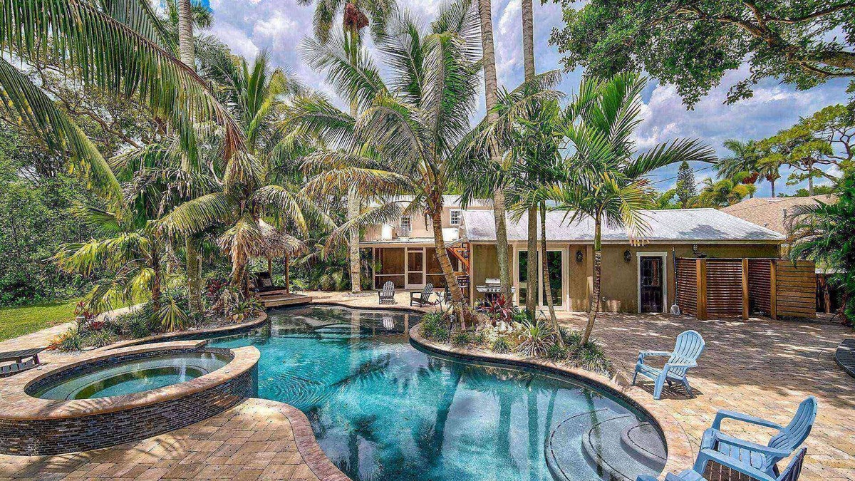 River District House | Escape to Villa Manteago: Resort-Style Estate with Pool, Spa, and Game Room, Minutes from Bradenton!