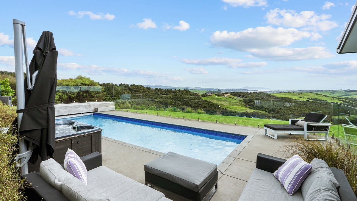 Mangawhai House | Exclusive home with uninterrupted views of the Hen & Chicks, set in Native Bush