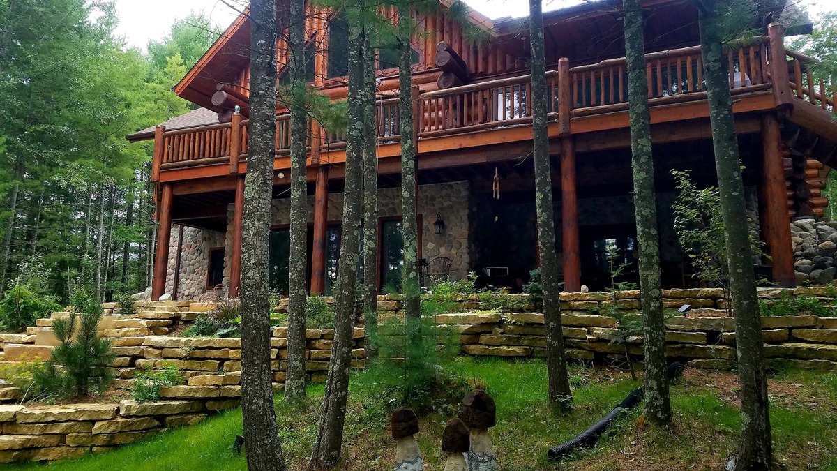 Elcho House | Executive Log Home on Beautiful Lower Post Lake All Seasons