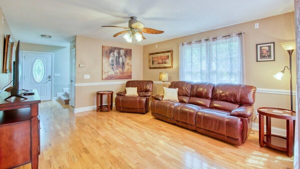 Johnson City House | Experience the serenity of a peaceful neighborhood and the excitement of the city .