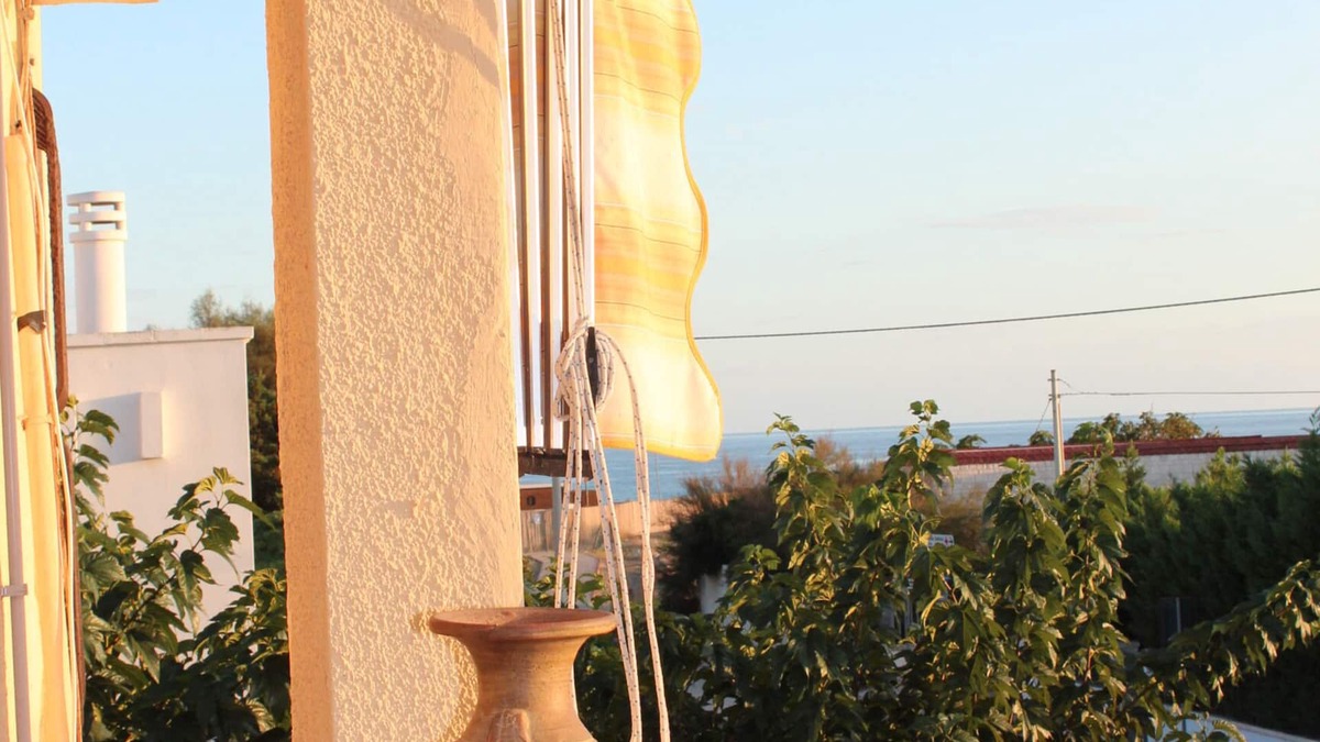 Campomarino di Maruggio Apartment | Fabulous: sea view, 50 meters from the beach, with garage, climate and barbecue