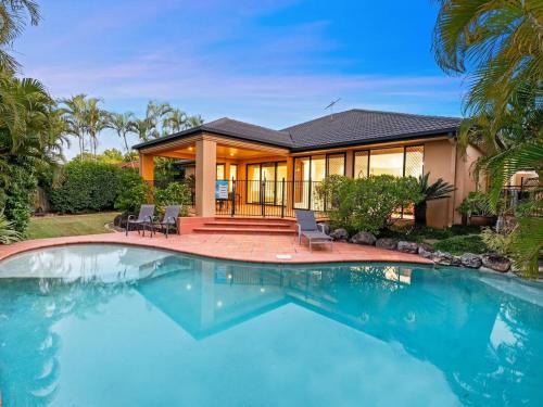 Parkinson House | Family Oasis with Pool Living Rooms and Peaceful Vibes