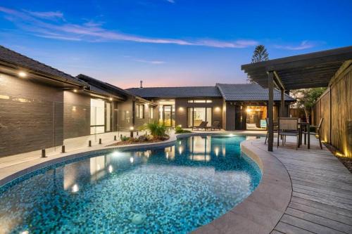 Bundall House | Family Waterfront Escape - Pool, 2 King rooms