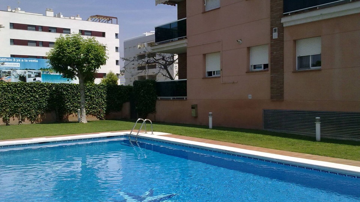 Calafell Apartment | Fantastic low corner with pool, WIFI and A/C